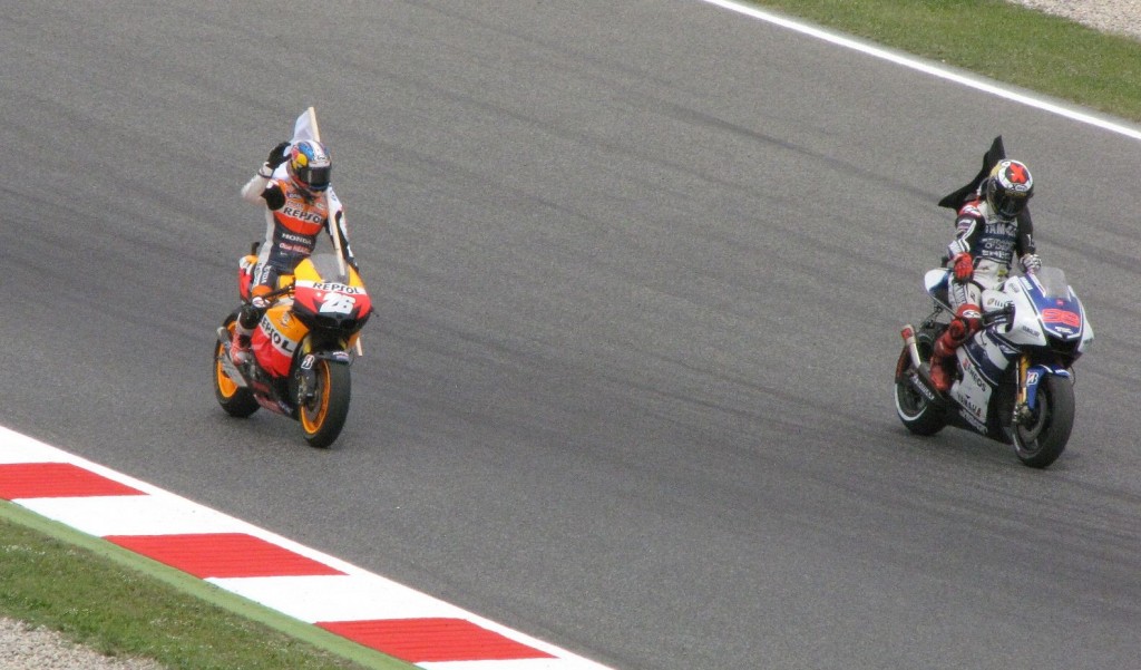 Jorge Lorenzo and Dani Pedrosa finishing 1st and 2nd in front of home fans