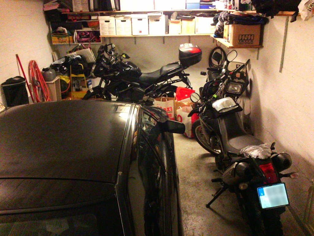 Proof that it is possible to park 3 motobikes and one car in a single garage, providing you park according to order of usage 