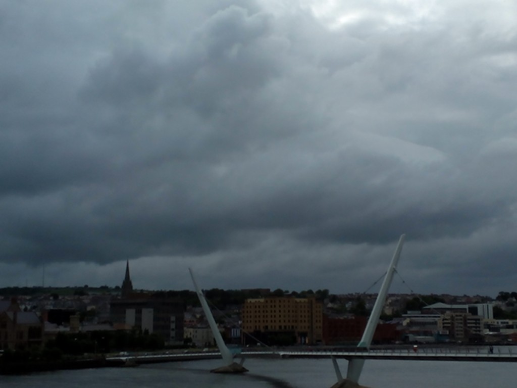 Running along the waterfront and over the peace bridge in Derry