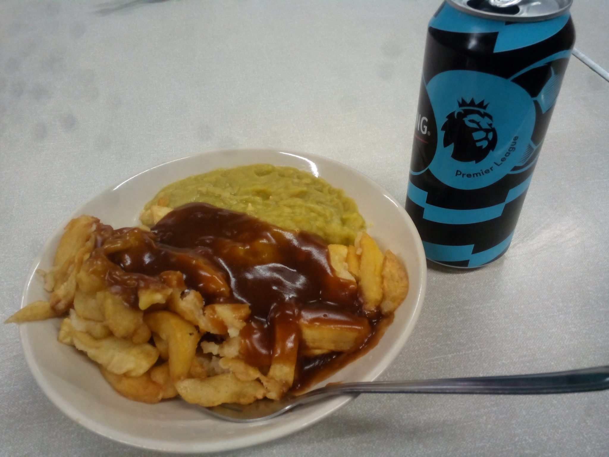 Manchester specialty, chips, mushy pies and gravy - yummy scrummy!